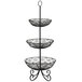 A Tablecraft three tiered black metal display basket with legs.