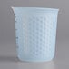An OXO Good Grips translucent plastic measuring cup with a handle.
