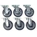 A set of six Regency casters with metal swivel wheels.