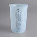 An OXO Good Grips Squeeze & Pour measuring cup with a measuring scale.