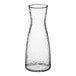 A Front of the House Drinkwise clear plastic carafe with a textured design.