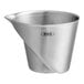 An OXO stainless steel measuring cup with a handle and logo.