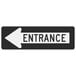 A black and white rectangular aluminum sign with the word "Entrance" and a left arrow in black.