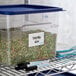 A plastic container with a Puracycle reusable label on it and a black marker.
