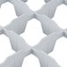 A close-up of a gray plastic grid for a Cambro Camrack extender.