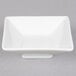 A CAC Citysquare bright white square porcelain bowl.