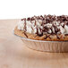 A chocolate pie with whipped cream in a D&W Fine Pack foil pie pan.