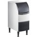 A Scotsman undercounter flake ice machine with a stainless steel base and black lid.