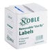 A white Noble Products box with green text reading "Noble Products 3" Use By Round Removable Label with Dispenser Carton - 500/Roll"