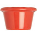 A close up of a red Carlisle ramekin.