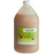 A jug of I. Rice banana milkshake base syrup with a label.