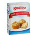 A white box of Krusteaz Professional Oat Bran Muffin Mix with a blue and white label.