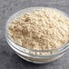 A bowl of Krusteaz Oat Bran Muffin mix on a table.