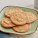 A plate of Krusteaz cookies on a table.
