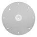 A white circular metal disc with small holes.
