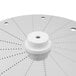 A white circular metal disc with small holes.