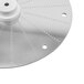 A Robot Coupe fine pulp grating disc, a circular metal disc with holes.