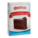 A white box of Krusteaz Professional Extra Moist Devil's Food Cake Mix with a slice of chocolate cake on the front.