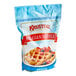 A blue bag of Krusteaz Belgian Waffle Mix.