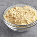 A bowl of Krusteaz Southern-Style Cornbread Mix, a yellow powder.