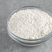 A bowl of Krusteaz funnel cake mix powder.