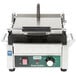 A Waring Panini Perfetto sandwich grill on a professional kitchen counter.