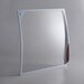 A white rectangular glass lid with a wooden handle for an Avantco freezer.