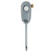A grey hand held device with a white push button.