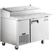 An Avantco stainless steel 1 door refrigerated pizza prep table.