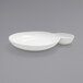 A close up of a white Front of the House Harmony Bento 2-compartment bowl.