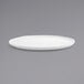 A Front of the House Harmony bright white porcelain plate on a gray background.