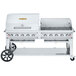 A large stainless steel Crown Verity outdoor grill on a cart.