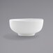 A white bowl with a small rim on a white background.