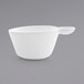 A white porcelain cup with a handle.