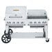 A large stainless steel Crown Verity outdoor grill on wheels.