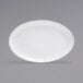 A white oval Front of the House porcelain plate.