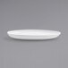 A white Front of the House Harmony oval porcelain plate on a gray background.