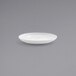 A Front of the House Harmony bright white porcelain plate on a gray surface.