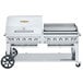 A large stainless steel Crown Verity outdoor grill with two burners.