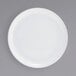 A white plate on a white background.