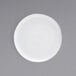 A white plate with a circular rim.