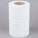 A Lavex Junior white center pull paper towel roll.