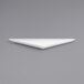 A close up of a Front of the House Mod triangle porcelain plate in white on a gray surface.