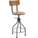 A BFM Seating Lincoln bar stool with a wooden seat and back on a metal frame.