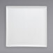 A Front of the House bright white square porcelain plate on a grey background.