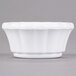 a white bowl with a white background