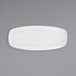 a white rectangular plate on a gray background