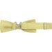 A yellow Henry Segal bow tie with metal buckles.