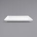 A white rectangular Front of the House porcelain plate on a gray background.