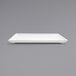 A Front of the House bright white rectangular porcelain plate on a gray background.